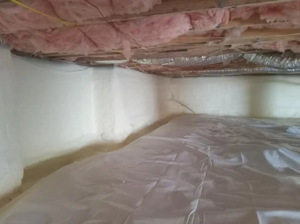 Crawl space encapsulation with closed-cell spray foam for Commercial Roof Restoration in Athens